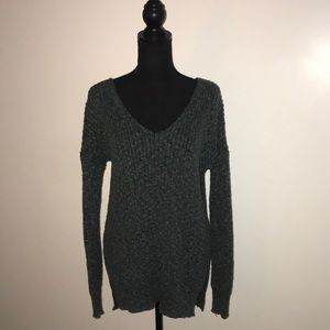 Teal long sleeved wool top.